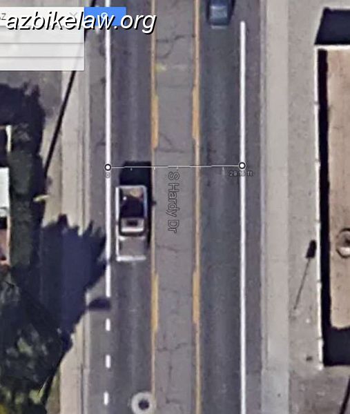 HardyDrBefore_01.JPG - Hardy Dr "before"Streetscape project completed early 2015. This is Hardy between 12th St and 12th Pl. BL-stripe-to-BL-stripe was ~ 29' -- that is 10' / 9' /10' lanes; curb-to-curb is just shy of 40' meaning BL gross width was about 5' each (including gutter pans). Also, south of 13th St, Hardy widens quite a bit to ~ 46' -- as usual, the extra width goes to the "car lanes" and BL stays cramped. These real dimensions seem to be a bit different that the claimed existing dimensions here http://www.tempe.gov/home/showdocument?id=8822 E.g. they claim the BLs are 6'. and 6'4". No way. There's a notation on that document that states measurement of road width is "to back of curb"; whatever that means... I think it means they claim the width of the curb is in the BL!