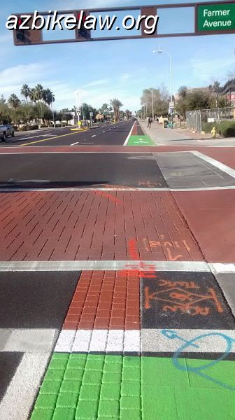 IMG_20150125_104157944_01.JPG - University Dr textured bike lane project / city of Tempe.The project area was between Priest Dr and Farmer; and also included adding some landscaped medians (prior to this it had a continuous center lane.The general dimensions of the bike lane are: gutter pan / bike lane (untextured) / bike lane (textured): 1.5 / 2/5 / 2.0 = 6 feet total including the texture.