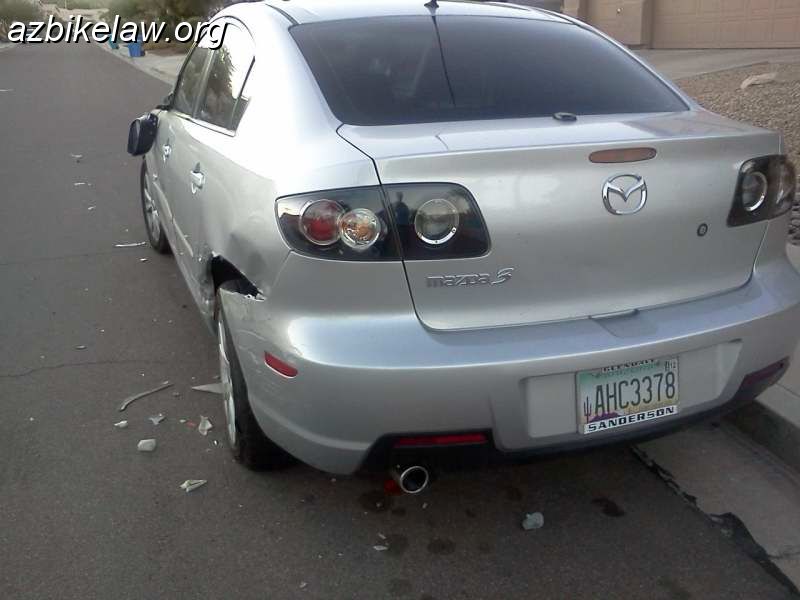 MayhemOnDBW.JPG - this car was badly damaged on the residential street where i live.