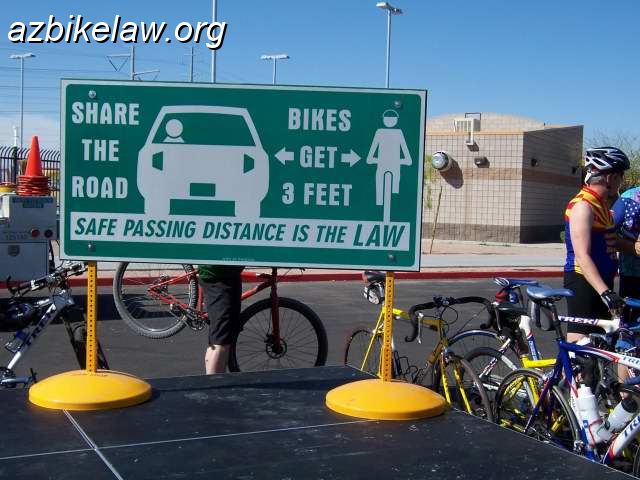 k07ac015.JPG - "Share the Road - Bikes Get 3 Feet - Safe Passing Distance Is The LAW"