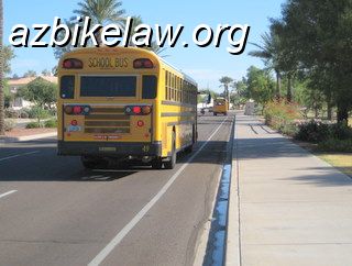 ray3.jpg - Ray Road, Phoenix AZ. Edgeline and small shoulder to the right of a narrow travel lane. This road is a signed Bike Route, incidentally    http://azbikelaw.org/blog/is-this-a-bike-lane/