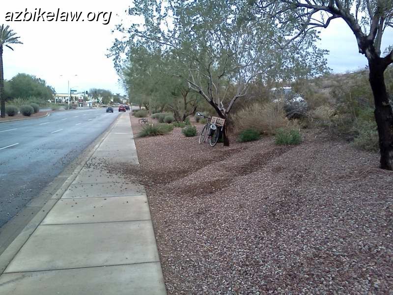 rayRoadRunoff.JPG - I found this car abandoned in the bushes. Had run off Ray Road near 44th St, Phx, crossed the sidewalk and landed in the bushes. 11/13/2011 (presumably in the early morning hours)