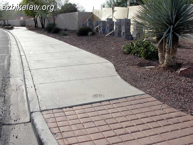rayWallDown.jpg - Another wall knocked down by another careless driver. Eastbound Ray Road just east of 34th St, Phoenix, AZ. Less than a month ago, another careless driver knocked down a wall exactly 2 blocks west of here (i.e. just east of 32nd Street and Ray Road). Both incidents appear to have been "simple inattention". In the earlier incident the driver denied texting/cell use altogether and indeed seemed not to even have a cell phone with them.