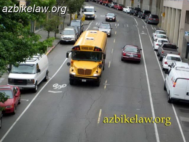 seattle.jpg - This is a little odd: up the hill was a (somewhat door-zone) bike lane, down the hill was a shared-lane marking ("sharrow").  Seattle, WA